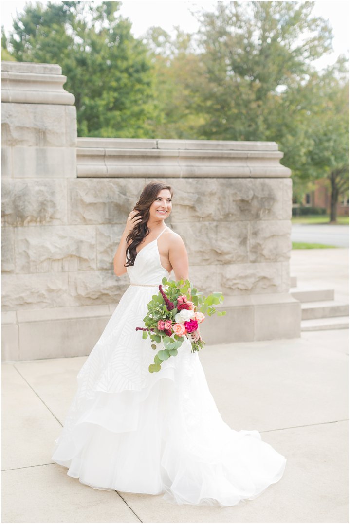bride with bridal bouquet in Hayley Paige wedding dress at Dilworth United Methodist Church in Charlotte NC on wedding day