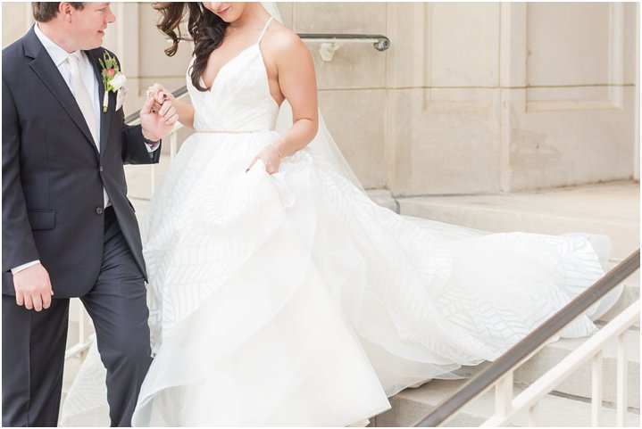 bride and groom on steps of Dilworth United Methodist Church in Charlotte NC on wedding day
