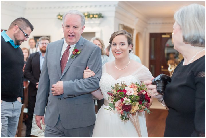 bride walking down the aisle with dad on her wedding day at Ryan Nicholas Inn