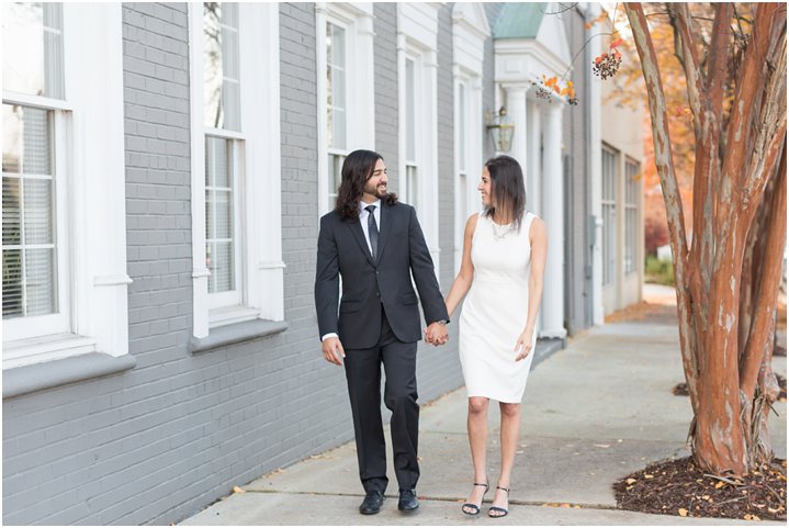 couple walking at Downtown Greenville engagement session