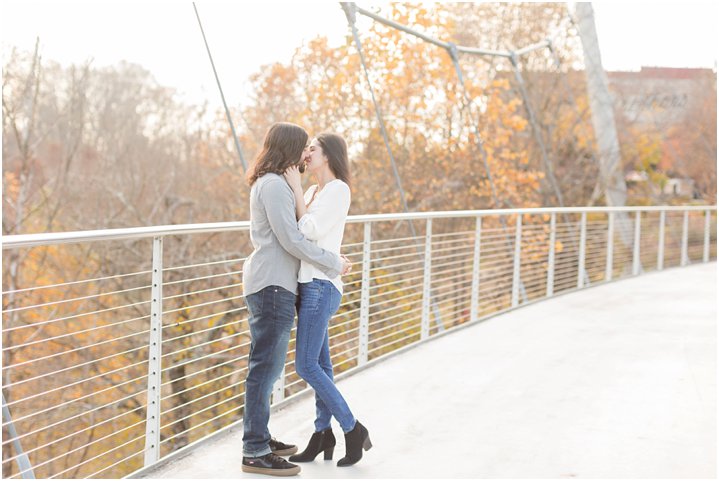 Kiss on Liberty Bridge Downtown Greenville engagement session