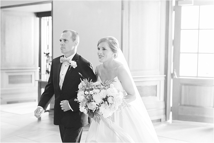 bride walks down the aisle with dad Furman Chapel wedding Greenville