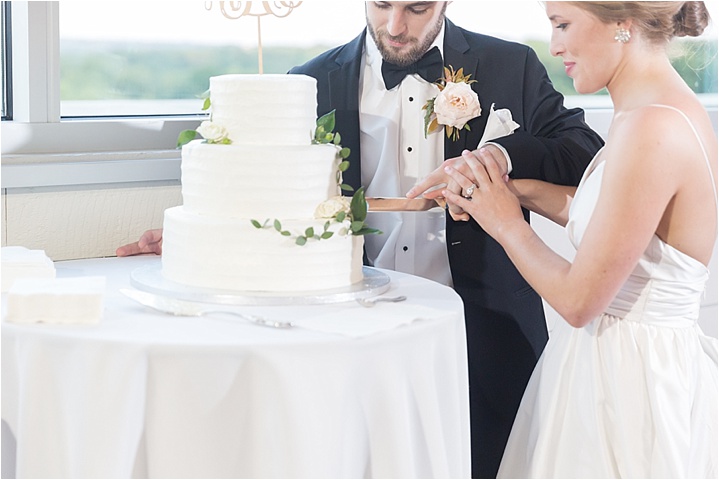 cake cutting rooftop wedding reception