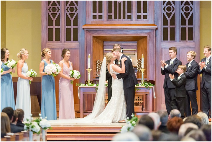 bride and groom first kiss furman chapel ceremony
