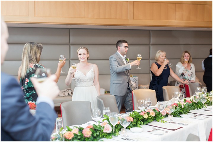 celebratory toast with bride and groom ryan and alyssa photography