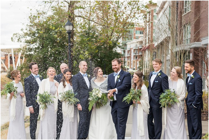 wedding party downtown Greenville champagne pop