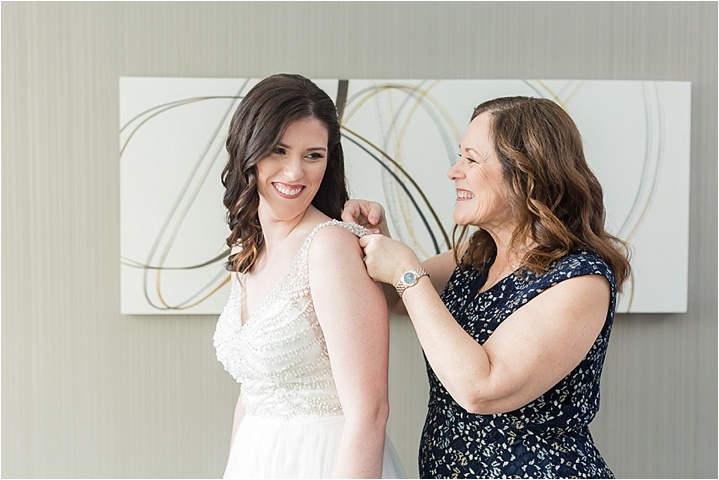 bride getting ready with Mom downtown Greenville SC wedding
