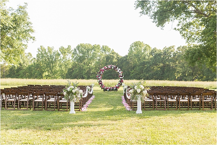 floral circle arch colorful spring ceremony ryan and alyssa photography