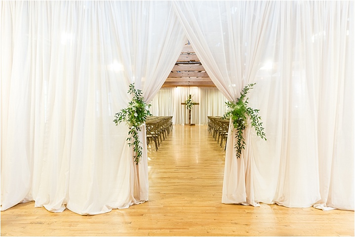 indoor hugenot loft ceremony with white and gold decor