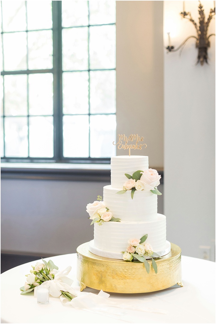 gold and greenery wedding cake