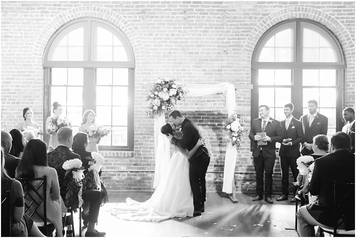 bride and groom first kiss greenville sc