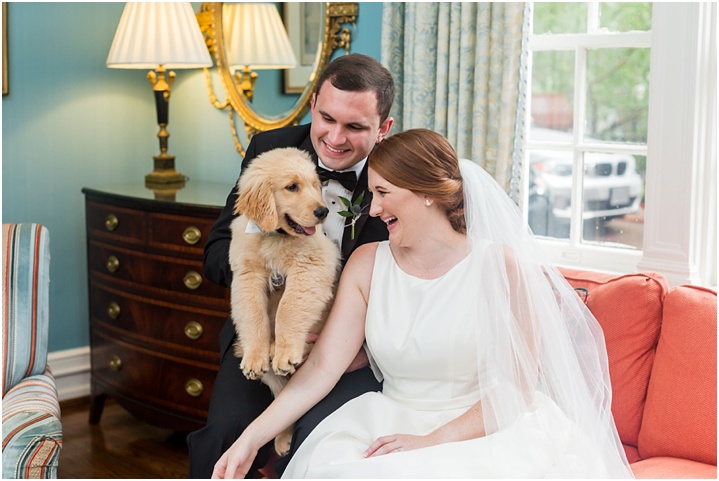 bride and groom with puppy at poinsett club wedding