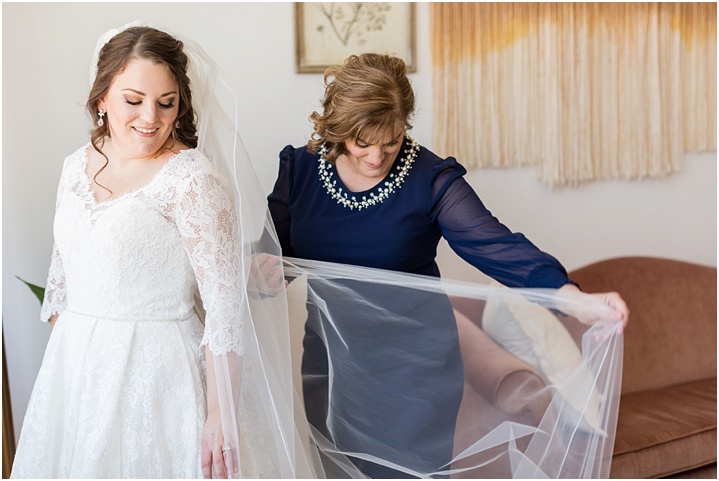 bride getting ready with mom wedding photography